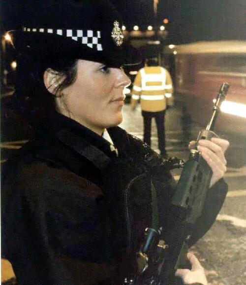 1785396659201_Female_with_SA80A2.jpg